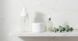 Simple minimalist skincare routine products on a clean surface